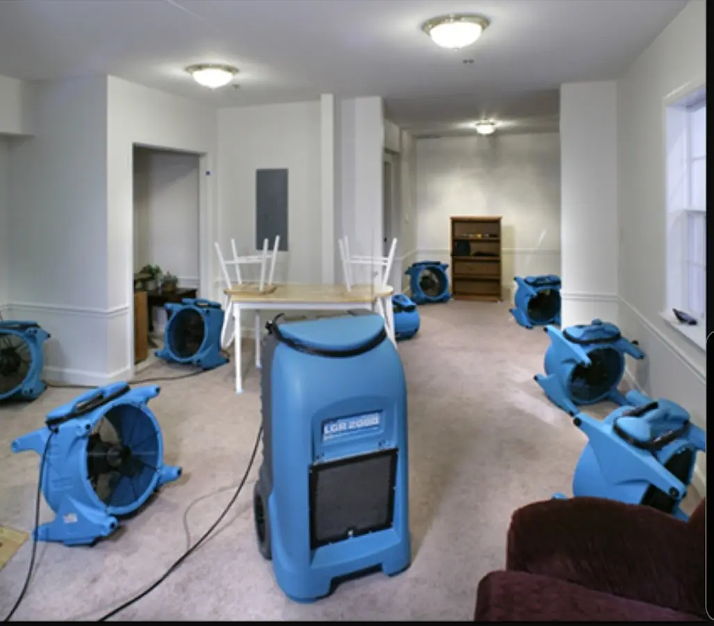 Air movers and dehumidifier setup for Water Damage Restoration in Youngsville